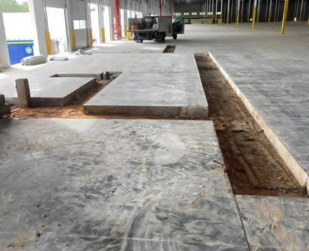 Demolition and concrete cutting work in United Arab Emirates using heavy machinery on construction site